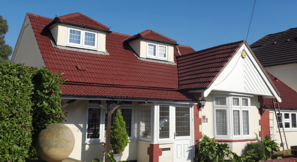 A house with a clean roof, the roof is coated. Roof cleaning, roof coating, roof cleaning near me, roof cleaning colchester, roof cleaning essex
