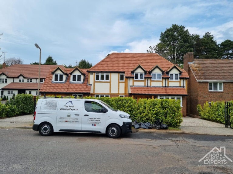 exterior wall cleaning services showing van outside large family home