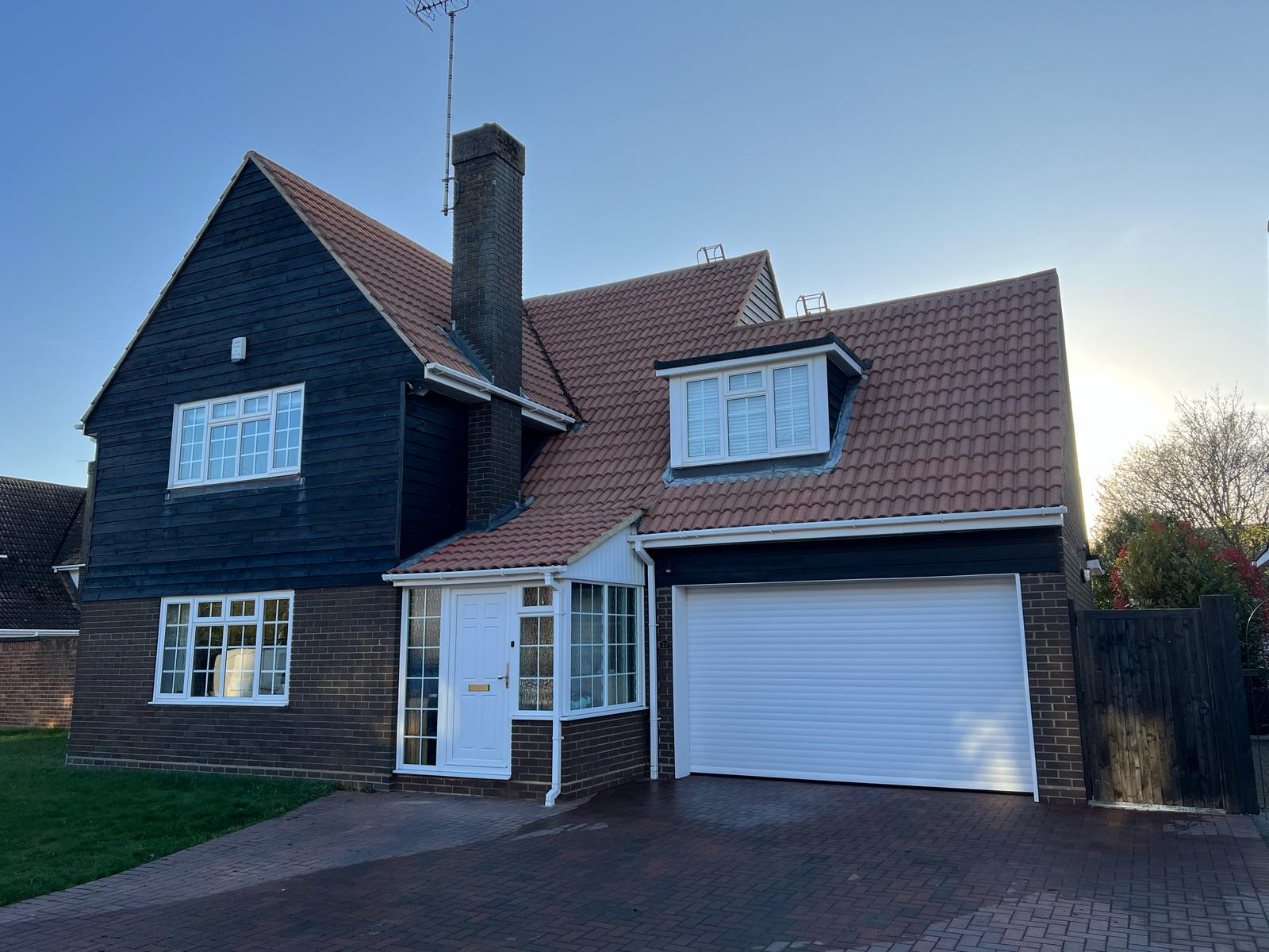 House roof cleaned by roof cleaning business