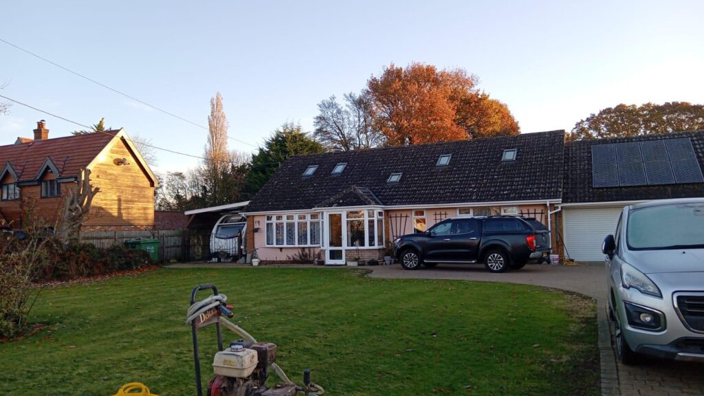Roof tile cleaning and coating completed on a bungalow, removing moss, algae and discolouration