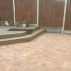 Renewed patio after patio cleaning by The Roof Cleaning Experts
